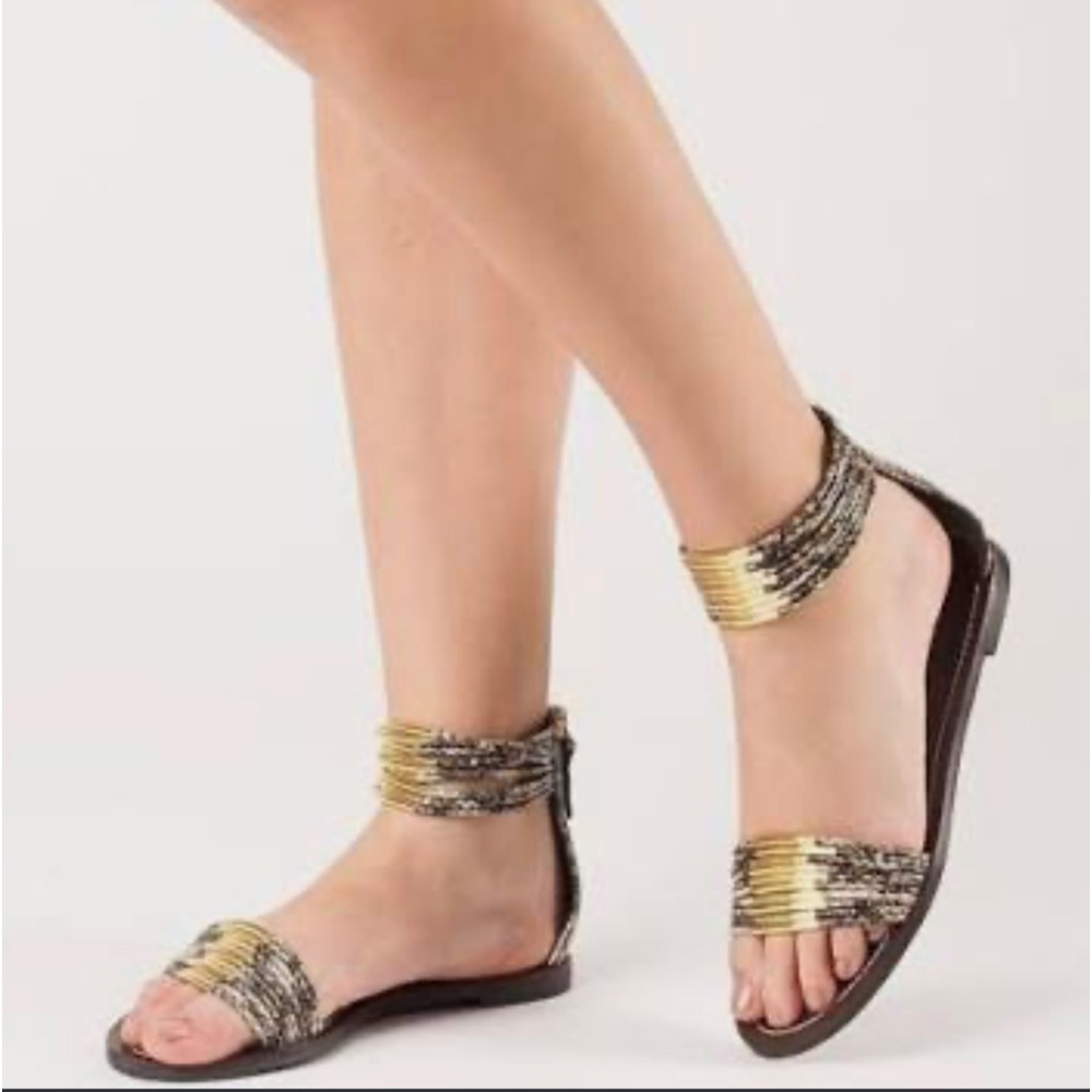 Tory Burch ankle sandals with gold and snake print